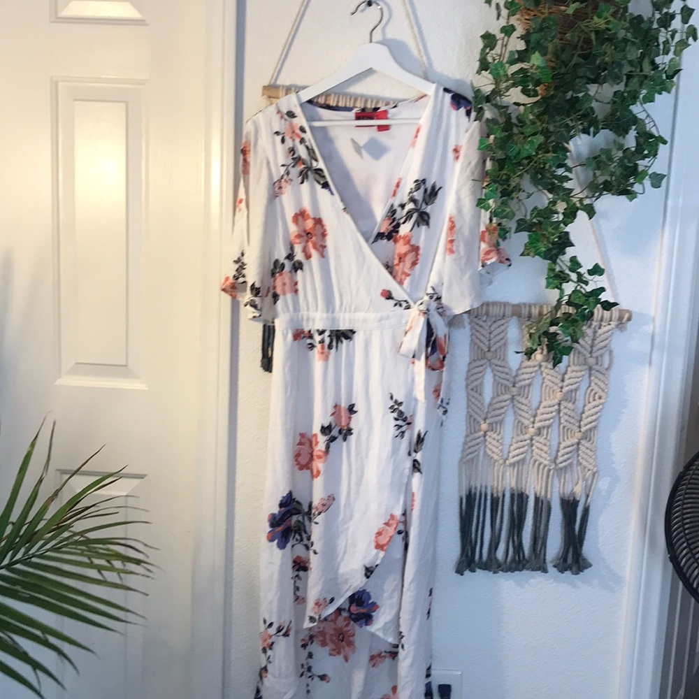 Tie front . High low white dress.